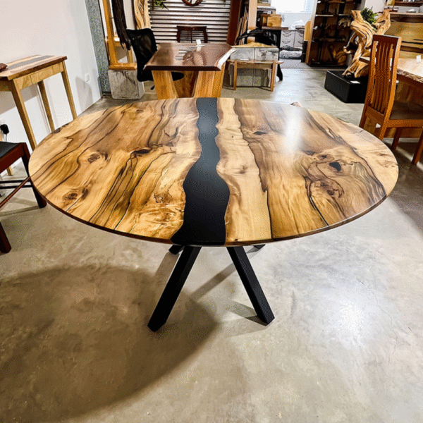 Handcrafted round dining table made from rare Blackheart Sassafras by David Suters Timbercraftsman