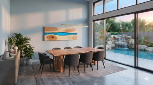 dining room with timber table, artwork and sideboard cabinet overlooking water feature and swimming pool through large sliding glass doors and windows